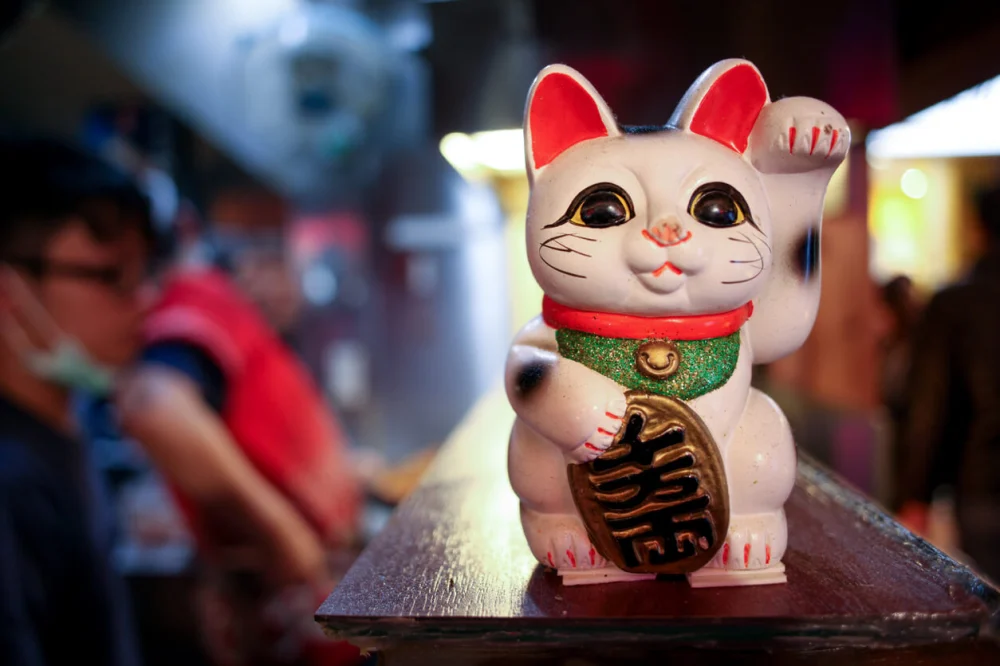 Why Are There Waving Cat Figurines in Japanese Restaurants?