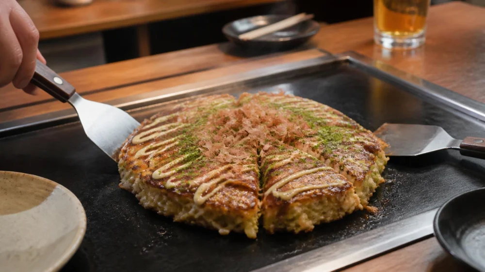 Okonomiyaki Guide: Styles, Toppings, and Table Etiquette